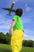 Boy Looking at Jet Boy Looking at Jet