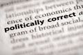 Close-up of the phrase 'politically correct' highlighted in a dictionary entry.